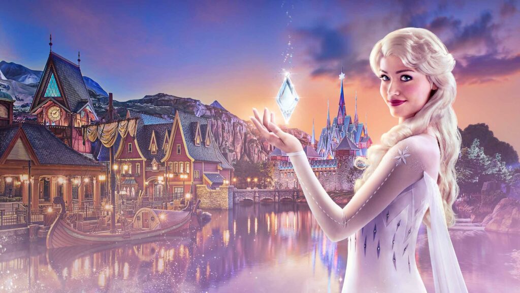Elsa fait apparaître un cristal de glace devant le village d'Arendelle et son palais, visuel de World of Frozen